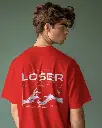 young-male-model-wearing-tshrit-mockup-against-green-background-scene1-0280 (16).webp