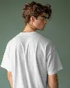 young-male-model-wearing-tshrit-mockup-against-green-background-scene1-0280.webp