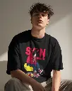 genz-model-with-curly-hair-posing-in-tshirt-mockup-0270 (1).webp