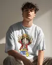 genz-model-with-curly-hair-posing-in-tshirt-mockup-0270 (10).webp