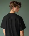 young-male-model-wearing-tshrit-mockup-against-green-background-scene1-0280 (1).webp